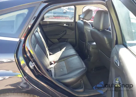 2014 Ford Focus Titanium z USA, uszkodzony, nr VIN 1FADP3N25EL188504